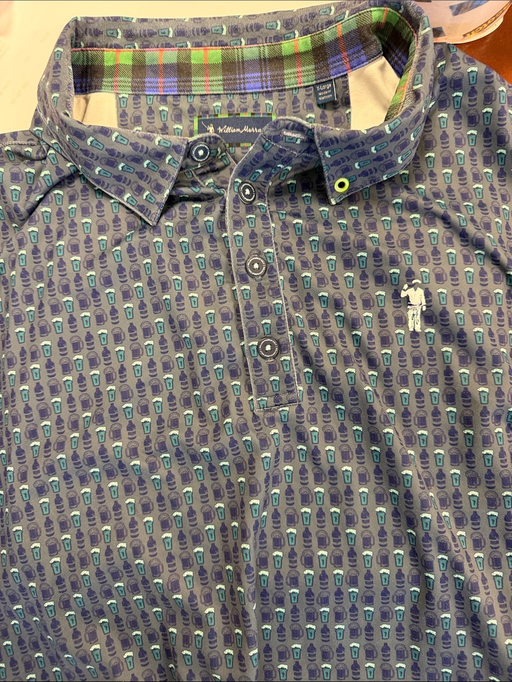Men's Blue Patterned Polo Shirt with Turquoise Accents